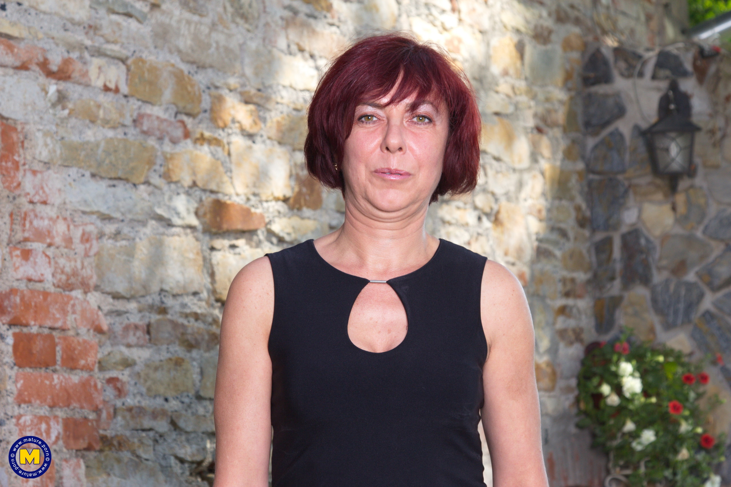 Sexy Redhead Woman Fingers Her Pussy