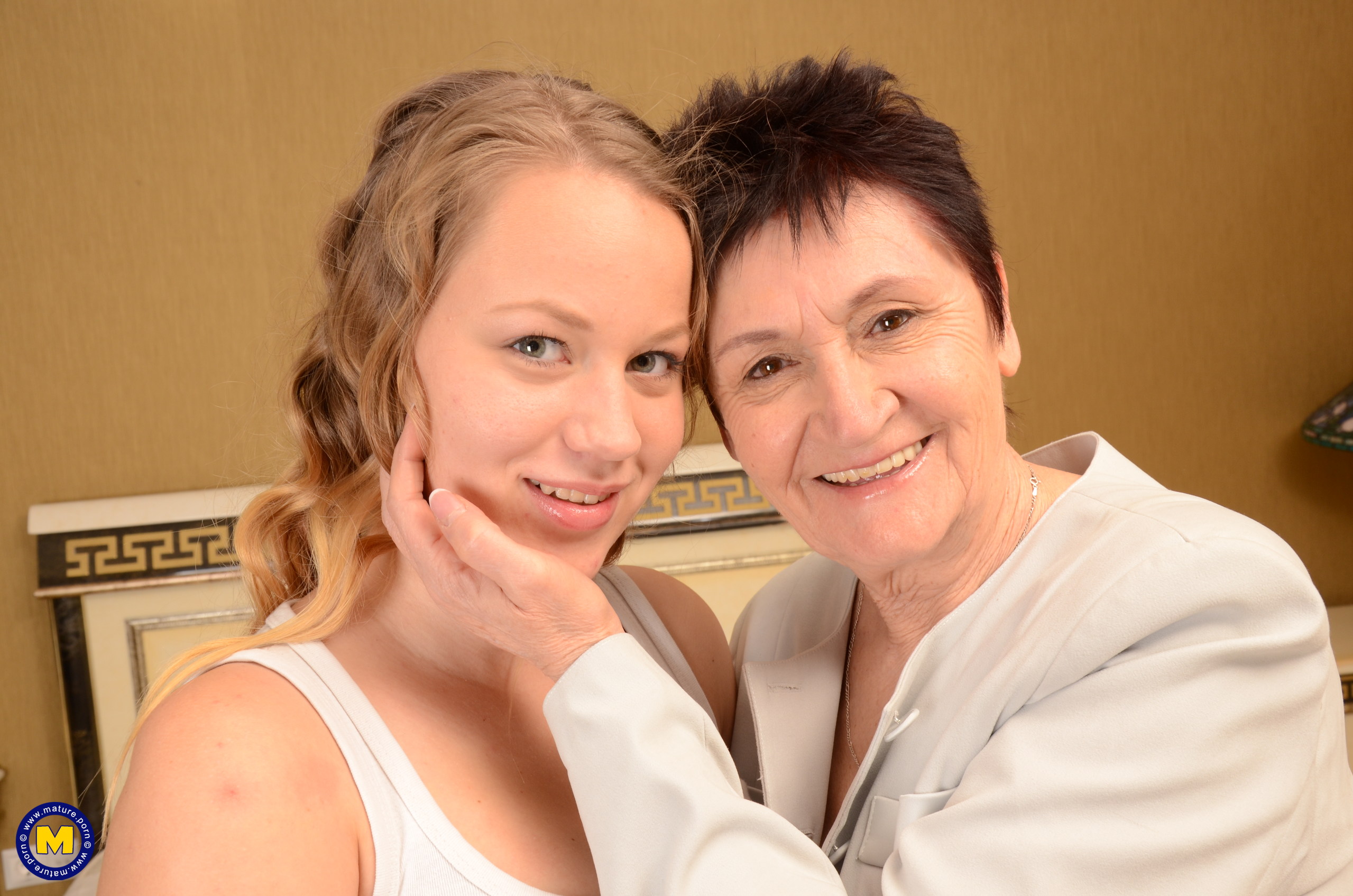 Mature Lesbian Playing with a Horny Young Babe