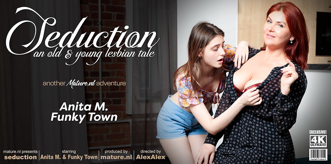 Teeny babe Funky Town gets seduced by her horny neighbour Anita M. in the living room